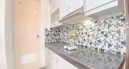 The Cozy Abode 2BR Apartment at Tamansari Panoramic