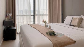 Apartemen Deluks (kingbed) | 1 kamar tidur, Wi-Fi gratis, dan seprai linen