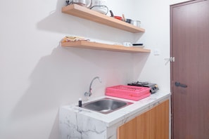 Private kitchen - Good and Homey Studio Apartment at Sudimara Forestwalk (South Tangerang)