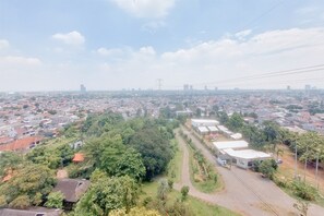 Deluxe Studio (queenbed) | View from room - Good and Homey Studio Apartment at Sudimara Forestwalk (South Tangerang)