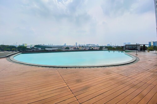 Chic and Cozy Studio at Patraland Urbano Apartment