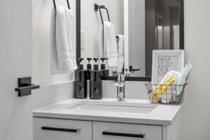 Hair dryer, towels, soap, shampoo