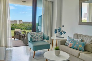 Luxury Apartment, Golf View, Beachside | Living area | 50-inch Smart TV with digital channels, Netflix, Hulu - Cana Rock Star - Golf - Piscina - Playa (Punta Cana)