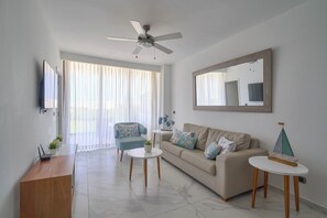 Luxury Apartment, Golf View, Beachside | Living area | 50-inch Smart TV with digital channels, Netflix, Hulu - Cana Rock Star - Golf - Piscina - Playa (Punta Cana)