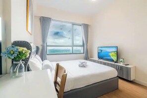 Departamento, 3 habitaciones | Ropa de cama de alta calidad, edredón y artículos del minibar gratis 