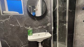 Hair dryer, towels, soap, shampoo