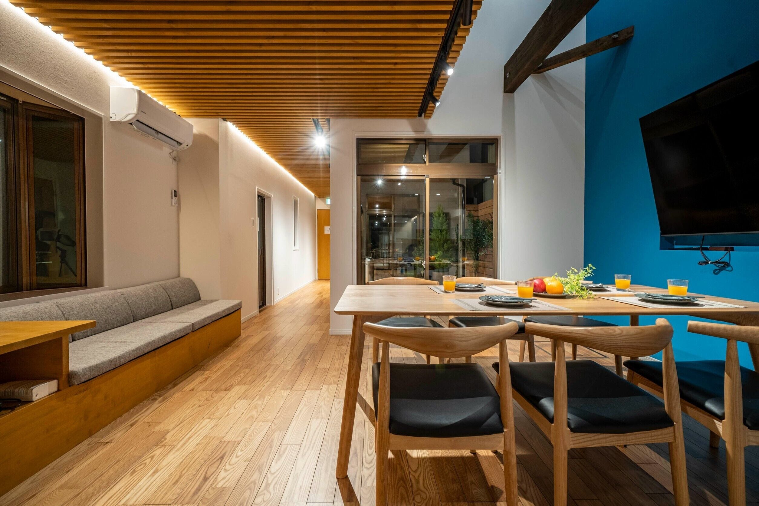 Apartment, Balcony | Living area | 85-inch flat-screen TV with digital channels, TV, video-game console