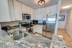 Fridge, microwave, coffee/tea maker, toaster