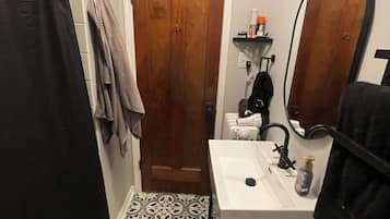 Hair dryer, towels, soap, shampoo