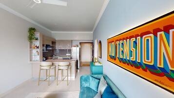 Premium Studio | Living area | 56-inch Smart TV with digital channels, books, streaming services