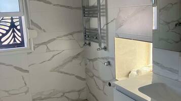 Shower, towels, soap, shampoo