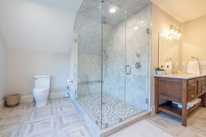 Shower, hair dryer, towels, soap