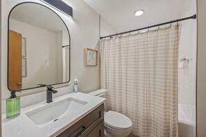 Hair dryer, towels, soap, shampoo