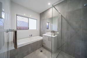 Shower, hair dryer, towels, soap
