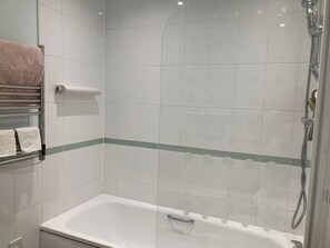 Apartment | Bathroom | Combined shower/tub, deep soaking tub, hair dryer, towels
