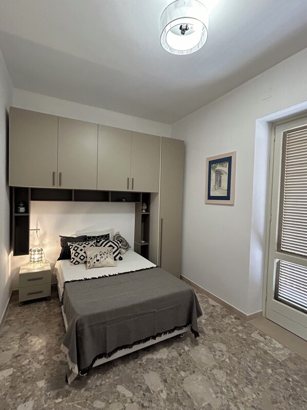 1 bedroom, desk, iron/ironing board, bed sheets