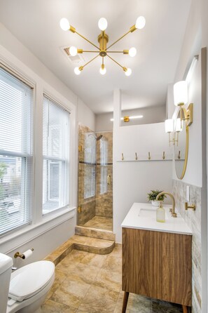 Shower, hair dryer, towels, soap