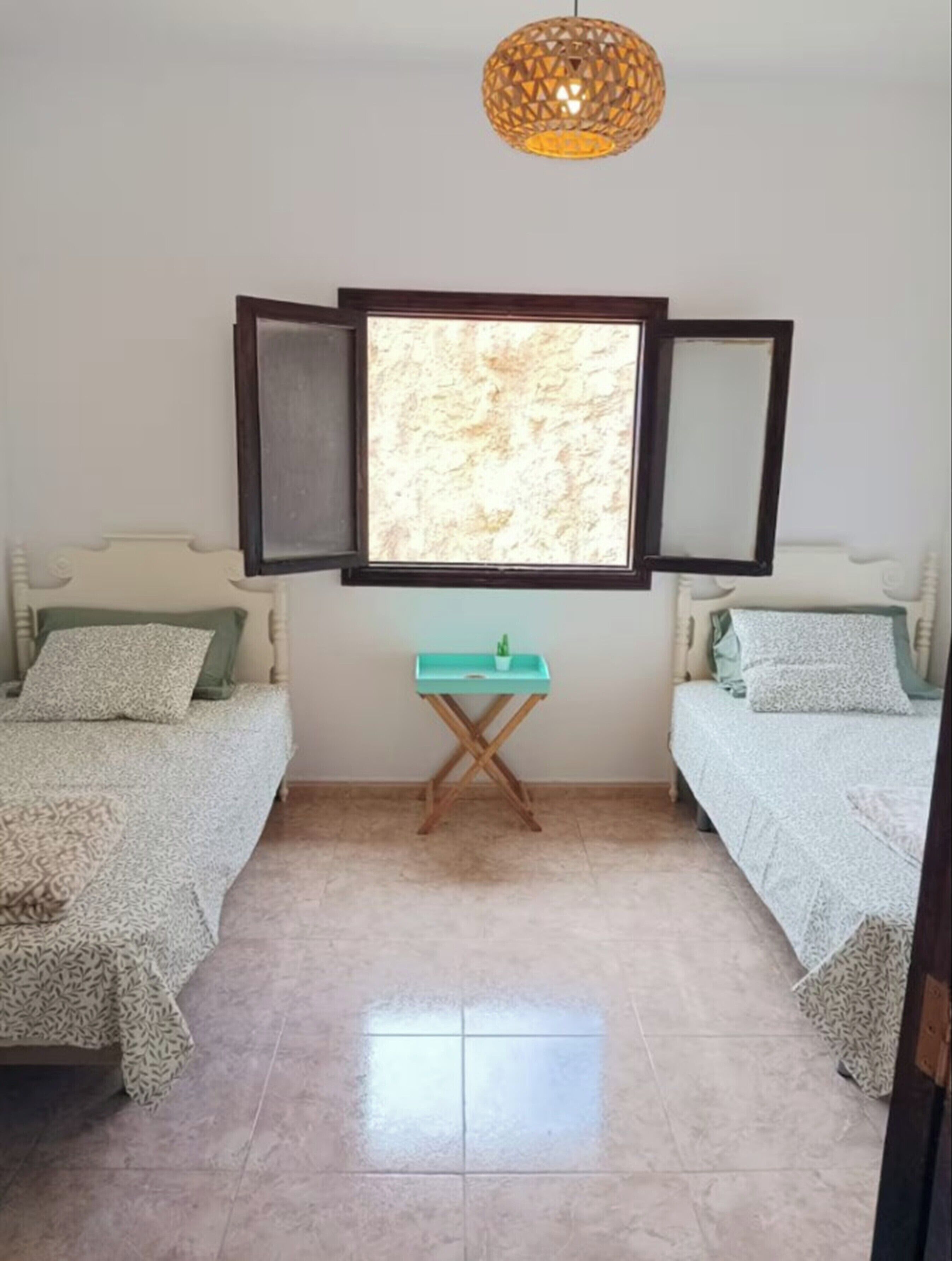 2 quartos, Wi-Fi de cortesia, roupa de cama