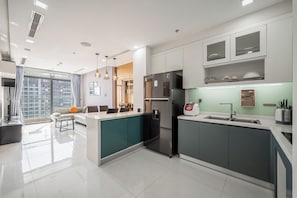 Comfort Apartment, 2 Bedrooms, City View | Private kitchen | Full-size fridge, microwave, rice cooker, cookware/dishes/utensils