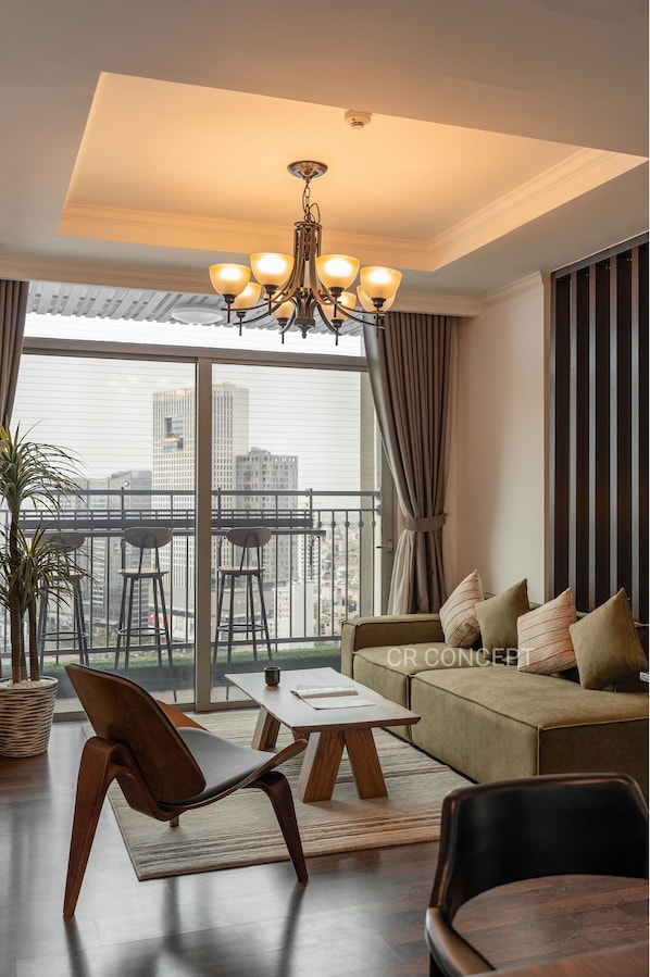 Signature Apartment, 3 Bedrooms, Balcony, City View | Living area | LCD TV