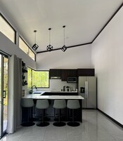 Family Villa, Garden View | Private kitchen | Paper towels