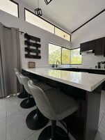 Family Villa, Garden View | Private kitchen | Paper towels