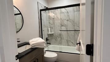 Hair dryer, towels, soap, toilet paper