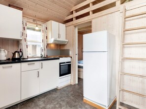Private kitchen - Cabin in Camping Resort With Heating (Lokken)