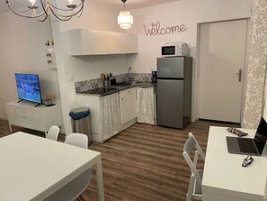 Fridge, microwave, coffee/tea maker, toaster