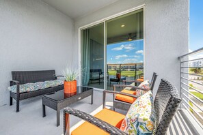 Terrace/patio - NEW Storey Lake condo w/views only minutes to Disney/Universal! FREE Water Park! (Kissimmee)