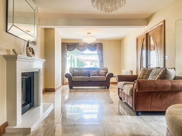 Living area - Relax in the hot tub and unwind in the peaceful, private garden. (Swansea)