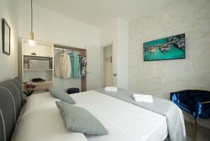 2 bedrooms, in-room safe, iron/ironing board, travel cot