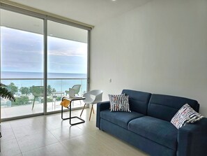 Apartamento | Área de estar | TV de tela plana