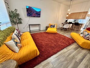 Smart TV, fireplace, books