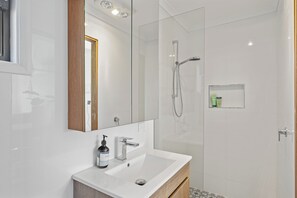 Shower, towels, soap, shampoo