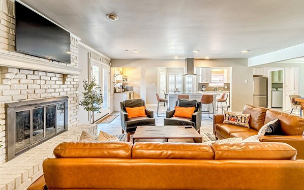 Smart TV, fireplace, books