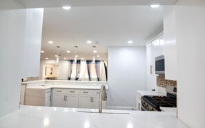 Fridge, microwave, oven, stovetop - Miramar Game Room Home Arcade · King Bed  15 Min to Beach (Miramar)