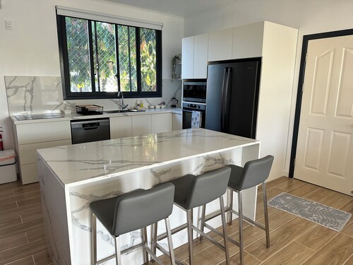 New 4-bedroom home in prime location in Taumeasina with AC in all rooms. 