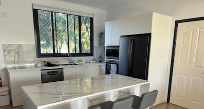 New 4-bedroom home in prime location in Taumeasina with AC in all rooms.