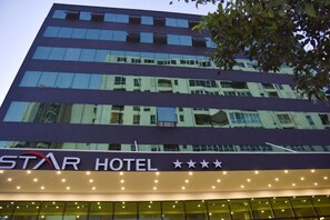 A multi-story hotel building with a sign indicating it is a STAR HOTEL. - Vh Eurostar Tirana Hotel Congress & Spa (Tirana)