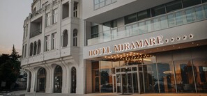 A hotel with a classic facade and a modern entrance. - Miramare (Crikvenica)