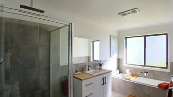 Shower, hair dryer, towels, soap