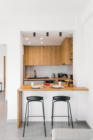Suite Studio Design, vue jardin | Cuisine privée