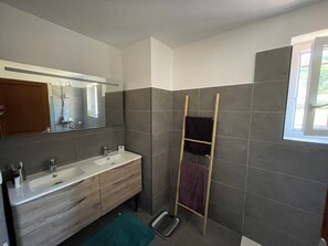 Shower, hair dryer, towels, soap