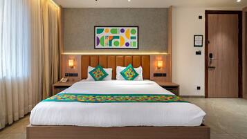 Deluxe Room | Individually furnished, desk, blackout drapes, iron/ironing board