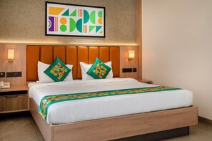 Premium Room | Individually furnished, desk, blackout drapes, iron/ironing board - Treebo Premium Lalitha, RK Beach (Visakhapatnam)