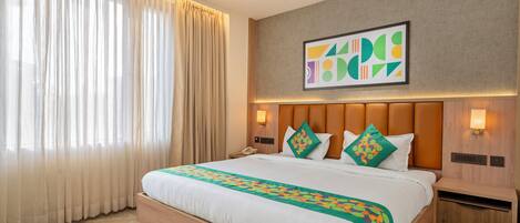 Premium Room | Desk, blackout drapes, iron/ironing board, individually furnished