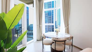 Deluxe Apartment, Balcony | In-room dining
