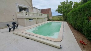 Een verwarmd zwembad