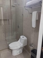 Comfort Room, Ensuite | Bathroom | Shower, towels, soap, shampoo